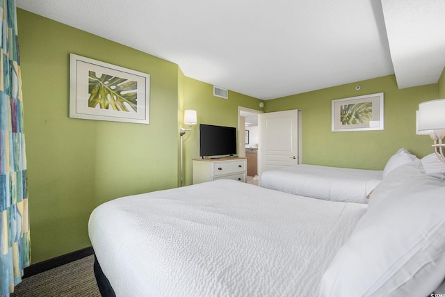 2301 Ocean Blvd S Unit 1218, Myrtle Beach, SC 29577 - bedroom featuring carpet flooring and baseboards
