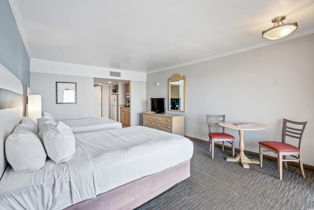 carpeted bedroom with crown molding