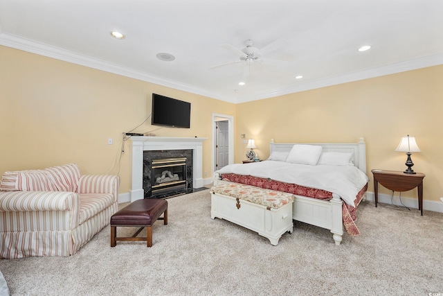 bedroom featuring recessed lighting, a premium fireplace, baseboards, ornamental molding, and light colored carpet