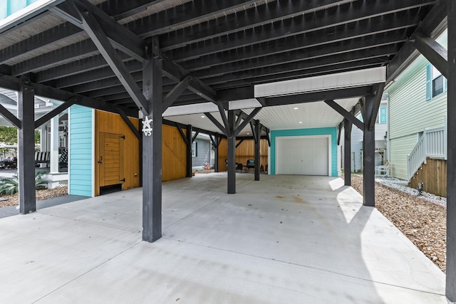 view of patio featuring a garage