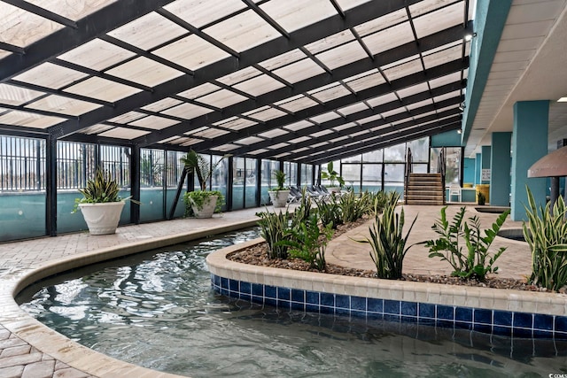 view of swimming pool with a patio