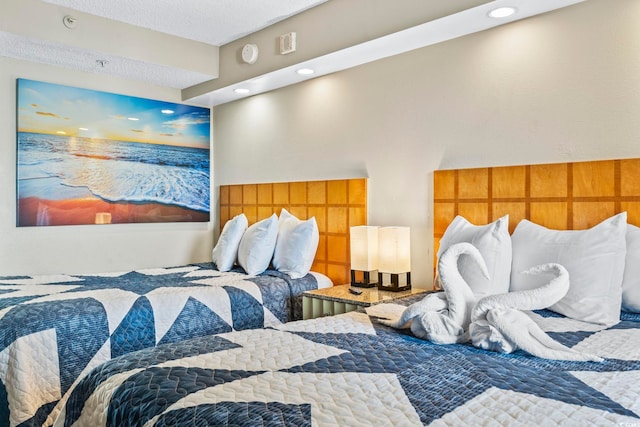 bedroom with recessed lighting
