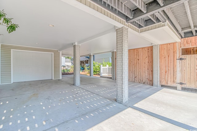 view of patio / terrace with a garage