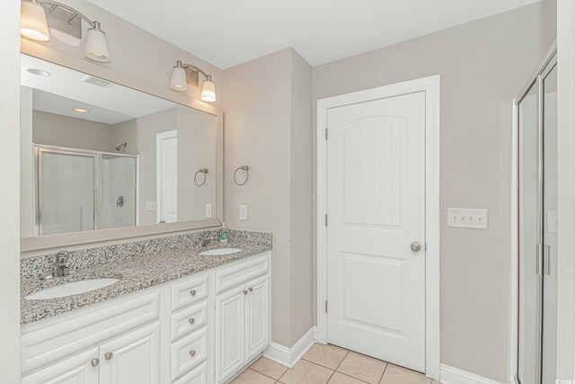 6001-MH32A S Kings Hwy, Myrtle Beach, SC 29575 - bathroom with an enclosed shower, vanity, and tile patterned floors