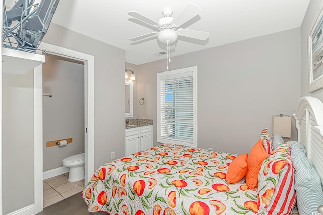 6001-MH32A S Kings Hwy, Myrtle Beach, SC 29575 - bedroom with tile patterned flooring, connected bathroom, and ceiling fan