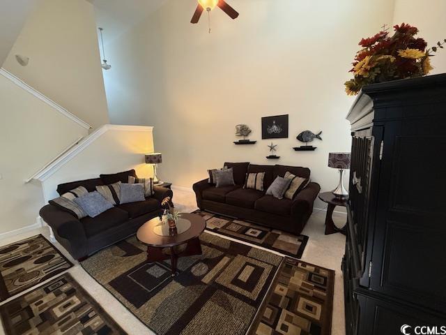 1188 Fairway Ln Unit 7, Conway, SC 29526 - living room featuring a high ceiling, ceiling fan, and a fireplace