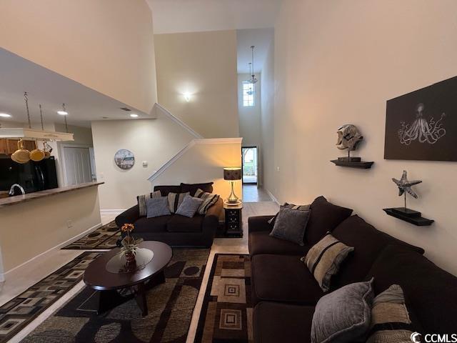 1188 Fairway Ln Unit 7, Conway, SC 29526 - living room with a high ceiling and baseboards