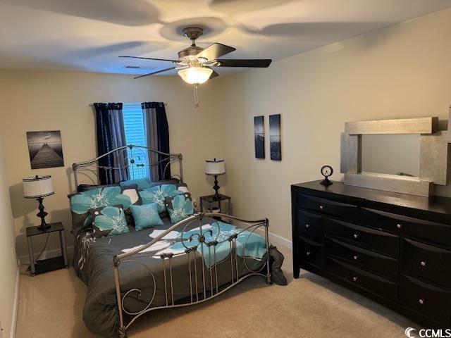 1188 Fairway Ln Unit 7, Conway, SC 29526 - bedroom with carpet flooring and ceiling fan