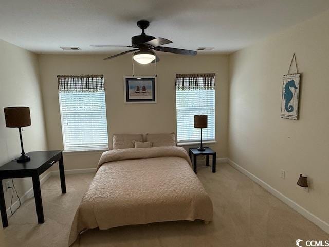 1188 Fairway Ln Unit 7, Conway, SC 29526 - bedroom featuring light colored carpet, multiple windows, and a ceiling fan