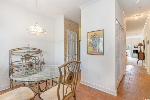 dining area with light tile patterned floors, an inviting chandelier, and ornamental molding