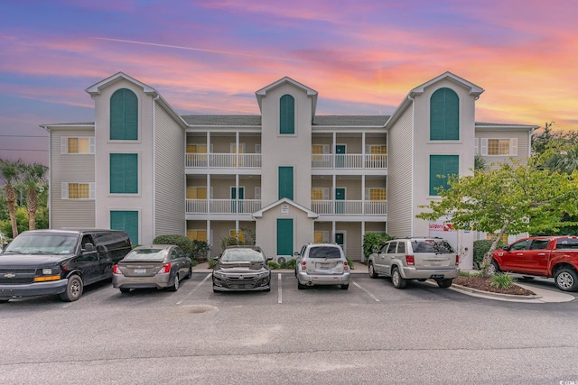 view of outdoor building at dusk