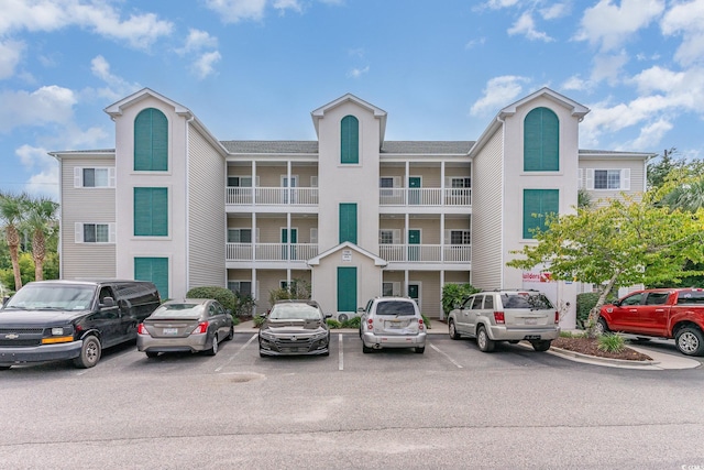 1100 Commons Blvd Unit 107, Myrtle Beach, SC 29572 - view of property with uncovered parking