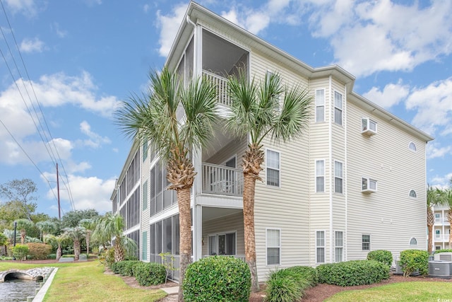 1100 Commons Blvd Unit 107, Myrtle Beach, SC 29572 - view of building exterior featuring central air condition unit