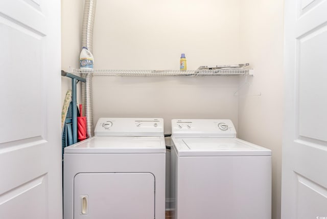 laundry room with washer and dryer