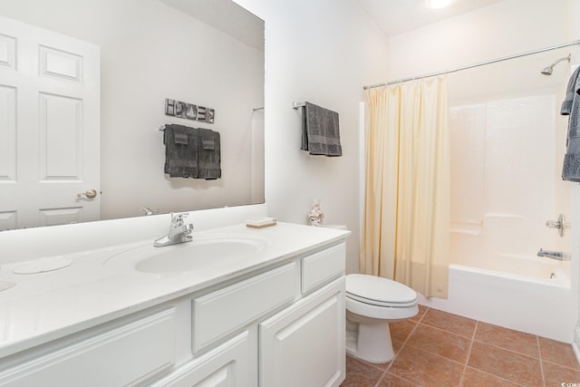 full bathroom featuring tile patterned flooring, toilet, shower / tub combo with curtain, and vanity