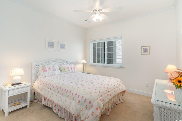 bedroom with ceiling fan, light colored carpet, and crown molding