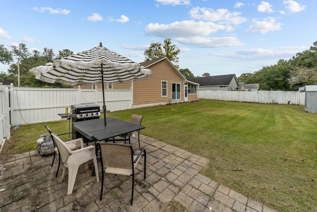 view of patio with a grill