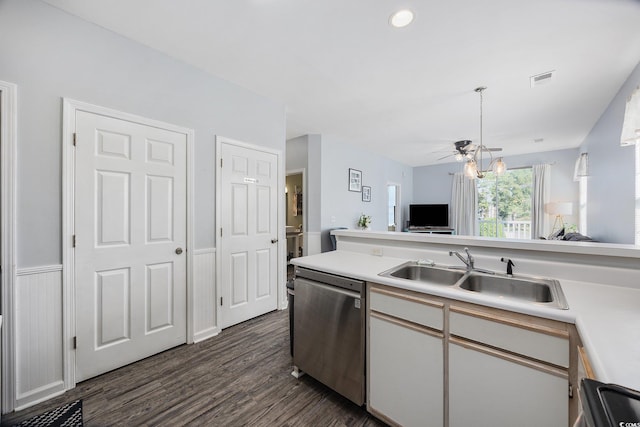 kitchen with white cabinetry, sink, dark hardwood / wood-style floors, and dishwasher