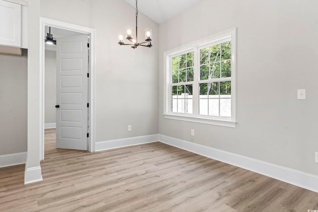 205 Waterfall Cir, Little River, SC 29566 - unfurnished dining area featuring a chandelier, light wood finished floors, baseboards, and vaulted ceiling