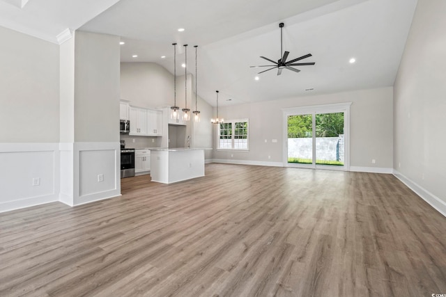 205 Waterfall Cir, Little River, SC 29566 - unfurnished living room featuring high vaulted ceiling, a ceiling fan, light wood-type flooring, recessed lighting, and baseboards