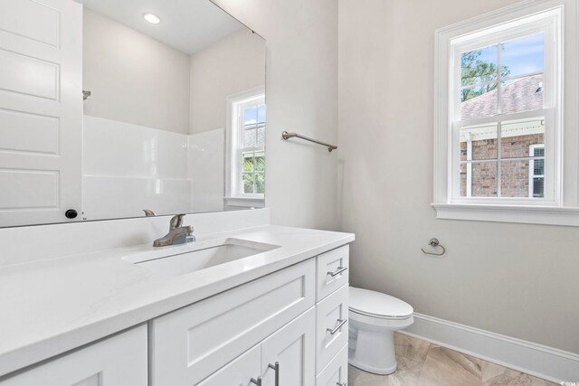 205 Waterfall Cir, Little River, SC 29566 - full bath with marble look tiles, vanity, plenty of natural light, and a shower