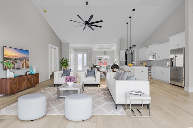 205 Waterfall Cir, Little River, SC 29566 - living area with ceiling fan, high vaulted ceiling, and light wood-style flooring