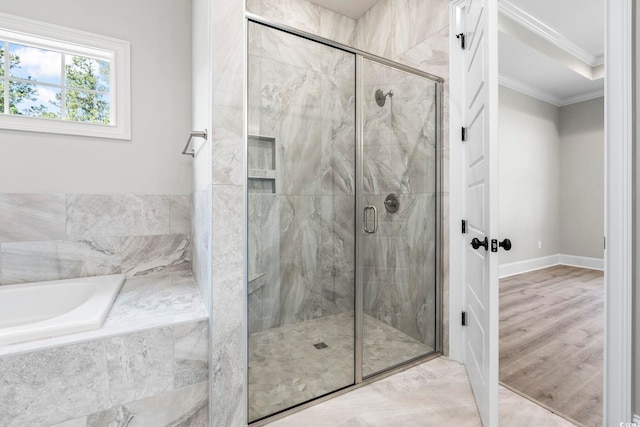 205 Waterfall Cir, Little River, SC 29566 - bathroom with ornamental molding, a bath, and a stall shower
