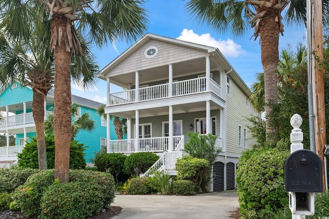 coastal inspired home featuring a balcony