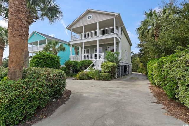 raised beach house with a porch