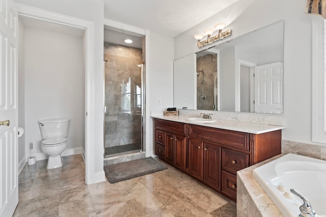 full bath with vanity, a stall shower, toilet, marble finish floor, and a garden tub