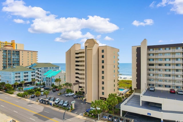 view of building exterior with a water view