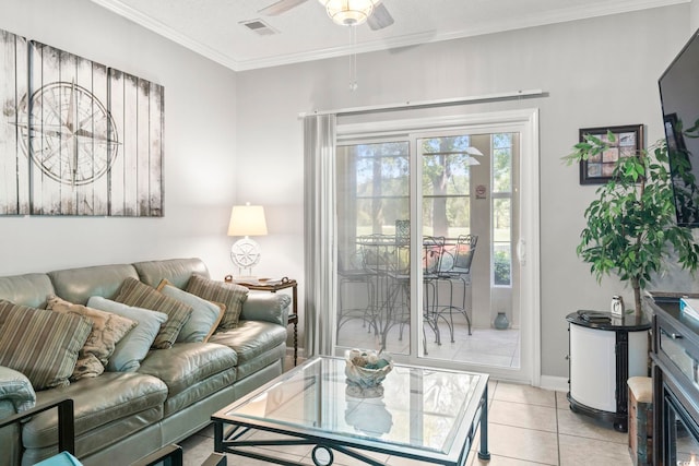 tiled living room with crown molding, a textured ceiling, and ceiling fan