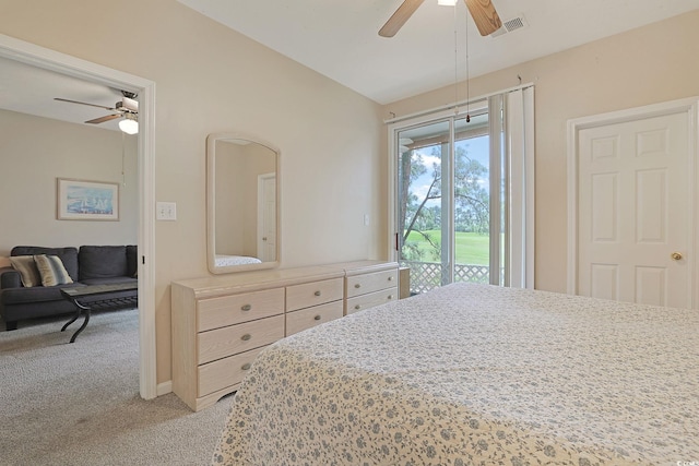 bedroom featuring ceiling fan, light colored carpet, and access to exterior