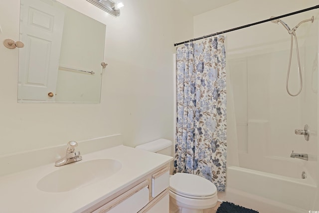 full bathroom with vanity, toilet, and shower / tub combo with curtain