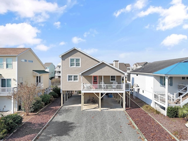 view of front of house featuring a carport