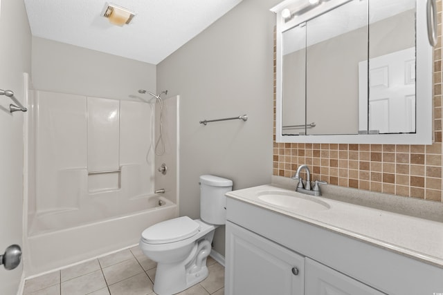 full bathroom with vanity, tile patterned flooring, toilet, tasteful backsplash, and shower / bath combination