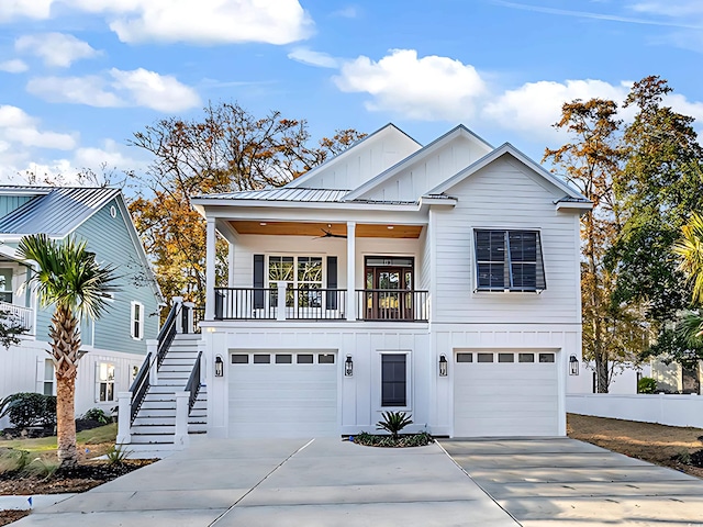 view of front facade with ceiling fan and a garage