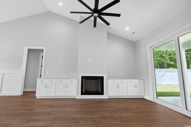 309 Waterfall Cir, Little River, SC 29566 - unfurnished living room with a glass covered fireplace, a ceiling fan, high vaulted ceiling, dark wood-style floors, and recessed lighting