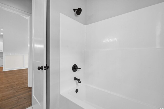 309 Waterfall Cir, Little River, SC 29566 - full bathroom featuring wood finished floors and  shower combination