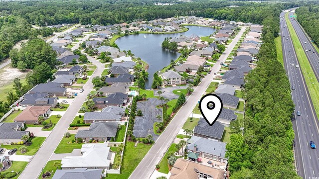 309 Waterfall Cir, Little River, SC 29566 - aerial view of property's location featuring nearby suburban area, a main thoroughfare, and a large body of water