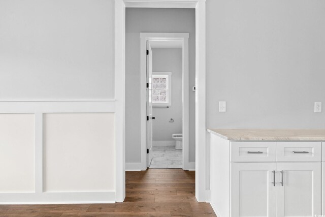 297 Waterfall Cir, Little River, SC 29566 - corridor with baseboards and wood finished floors