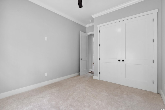 297 Waterfall Cir, Little River, SC 29566 - unfurnished bedroom with crown molding, carpet floors, a closet, ceiling fan, and baseboards