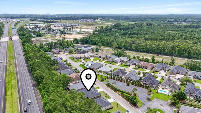 297 Waterfall Cir, Little River, SC 29566 - aerial view of property and surrounding area featuring a major roadway and nearby suburban area