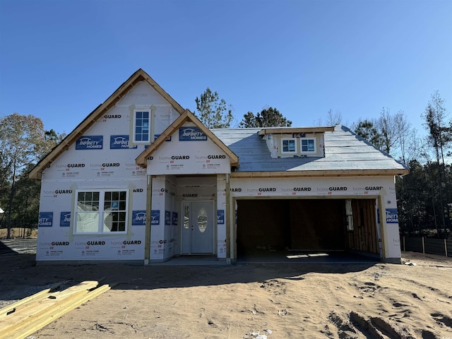 unfinished property with a garage