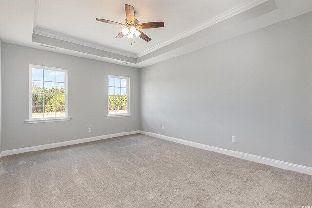 650 Timber Creek Dr, Loris, SC 29569 - carpeted spare room with a raised ceiling, ornamental molding, baseboards, and ceiling fan