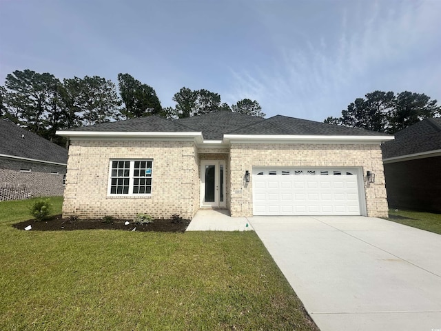 293 Waterfall Cir, Little River, SC 29566 - ranch-style home featuring brick siding, a garage, concrete driveway, and a front lawn