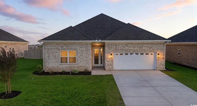 293 Waterfall Cir, Little River, SC 29566 - unfurnished living room with a raised ceiling, light wood-type flooring, recessed lighting, a glass covered fireplace, and a ceiling fan