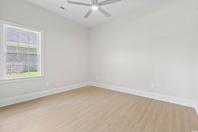 293 Waterfall Cir, Little River, SC 29566 - spare room featuring ornamental molding, a raised ceiling, light wood-style flooring, a ceiling fan, and recessed lighting
