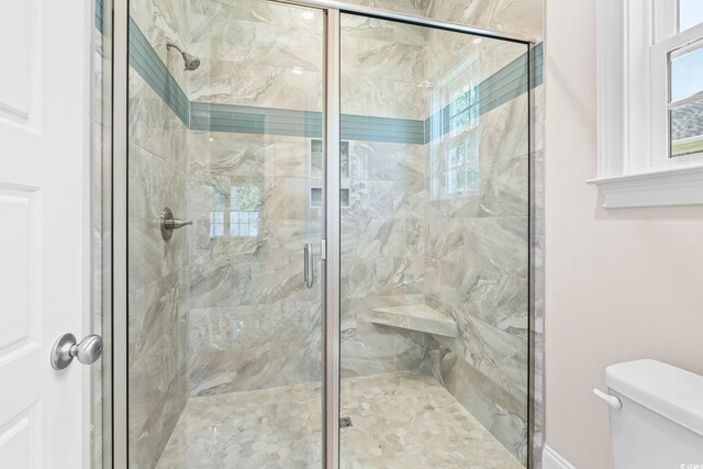 293 Waterfall Cir, Little River, SC 29566 - bathroom featuring toilet and a shower stall