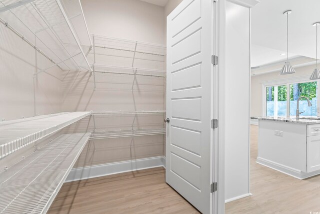 293 Waterfall Cir, Little River, SC 29566 - hall featuring light wood finished floors and baseboards